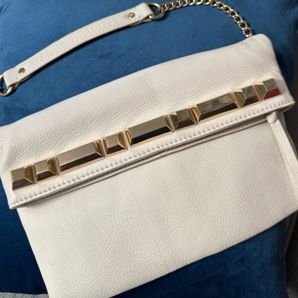 Vince Camuto White pebbled leather fold over shoulder bag with gold chain